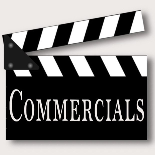 A movie clapper containing the text "COMMERCIALS"